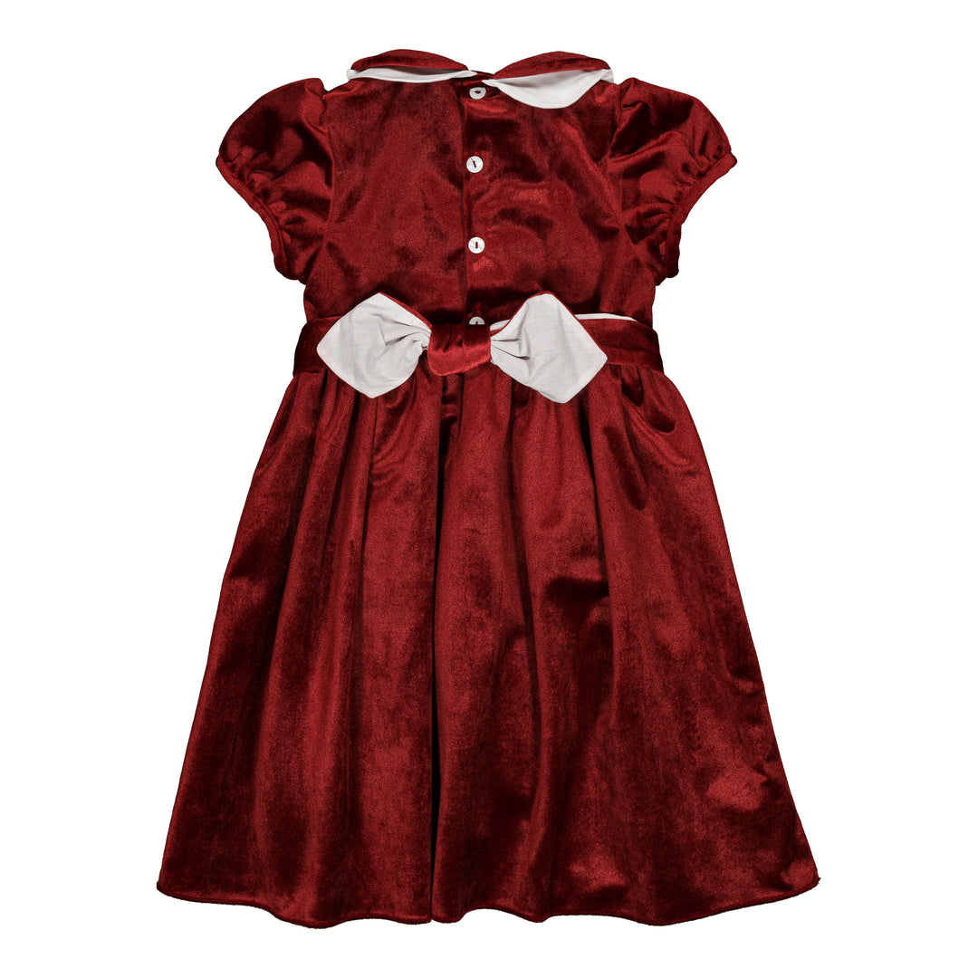 back view of girls velvet burgundy dress