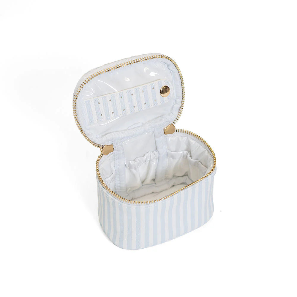 Travel jewelry box with gold accents on a white background