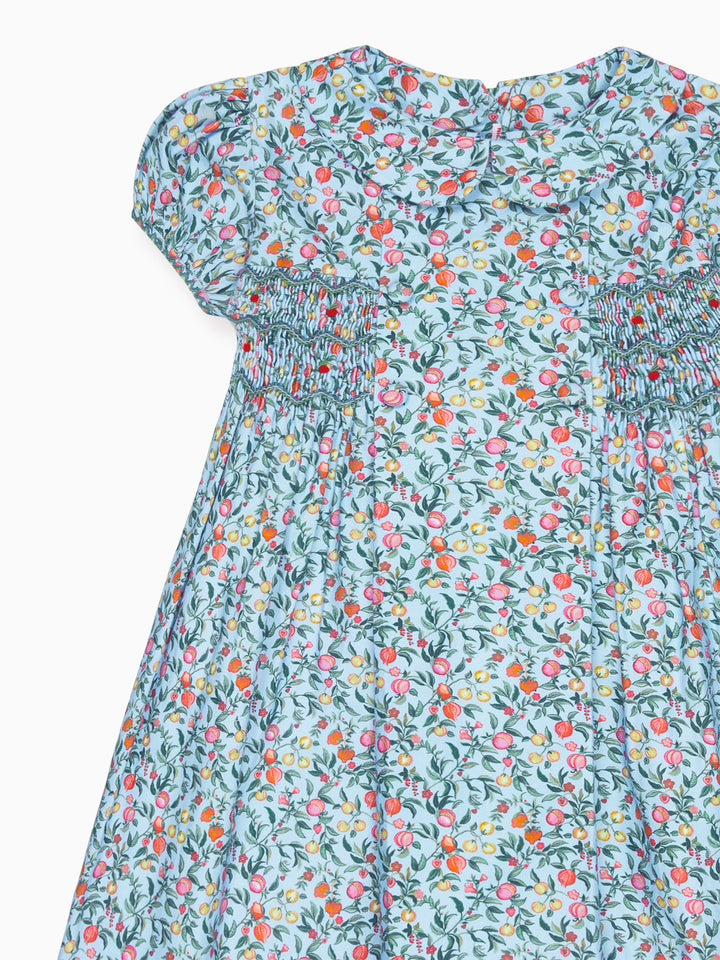 Floral dress with puff sleeves on a white background