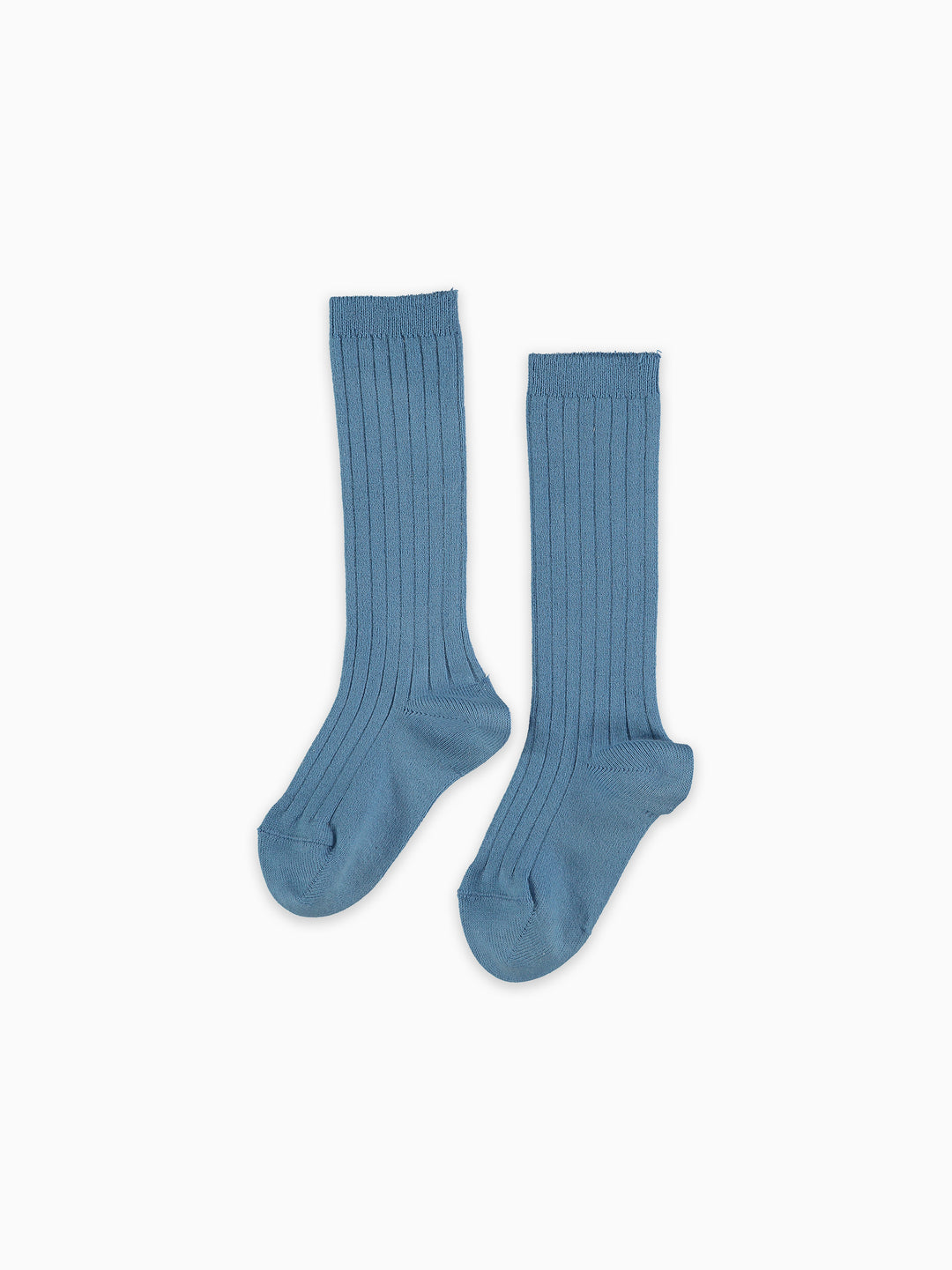 Pair of blue knee-high socks on a white background