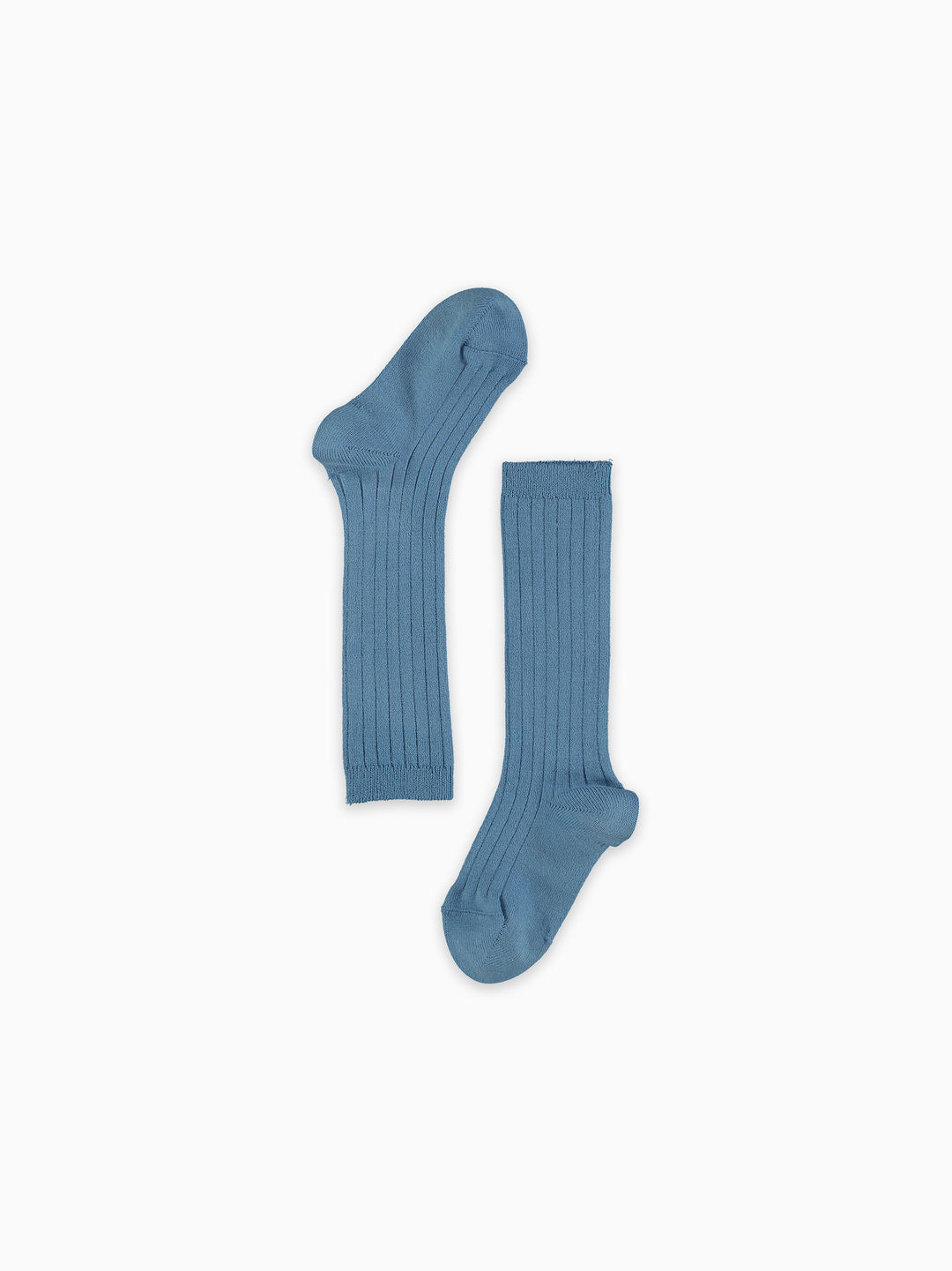 Two blue knee-high socks on a white background