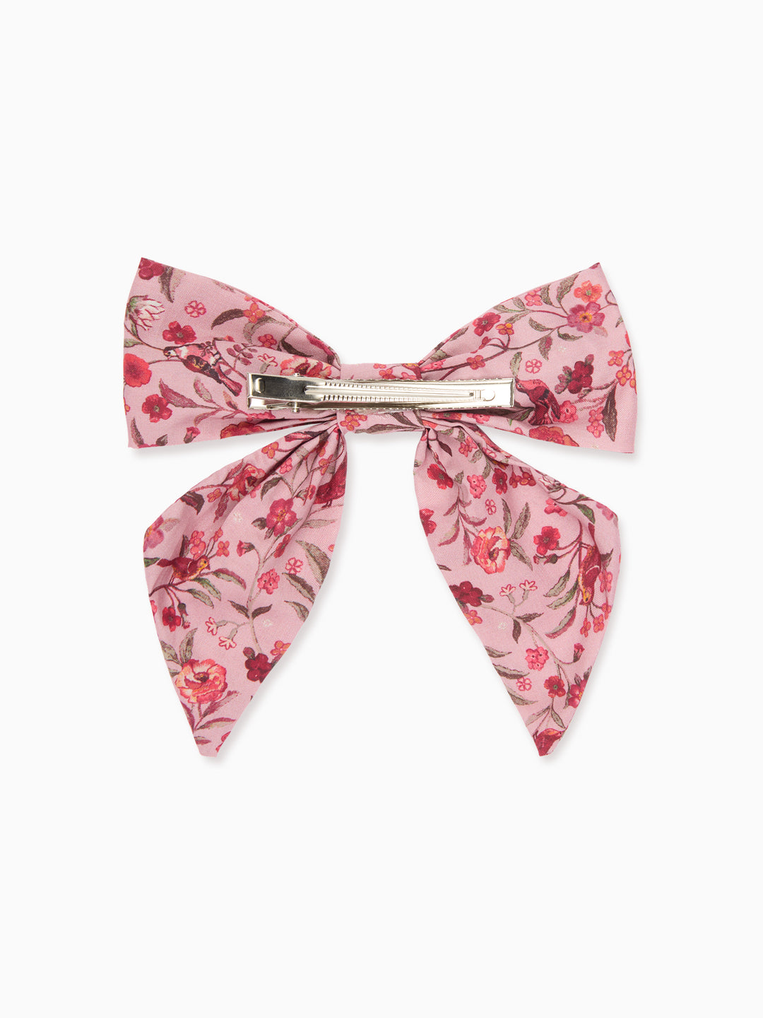 A pink floral hair bow with a silver metal clip, displayed flat against a clean white background.
