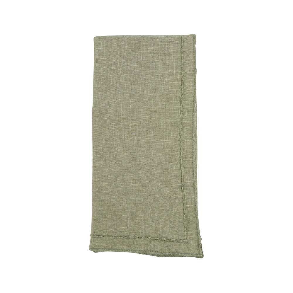 Folded green napkin on a white background