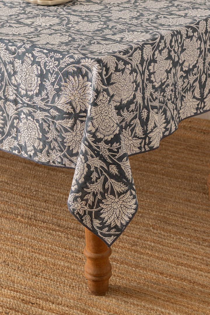 navy floral table cloth on wooden table