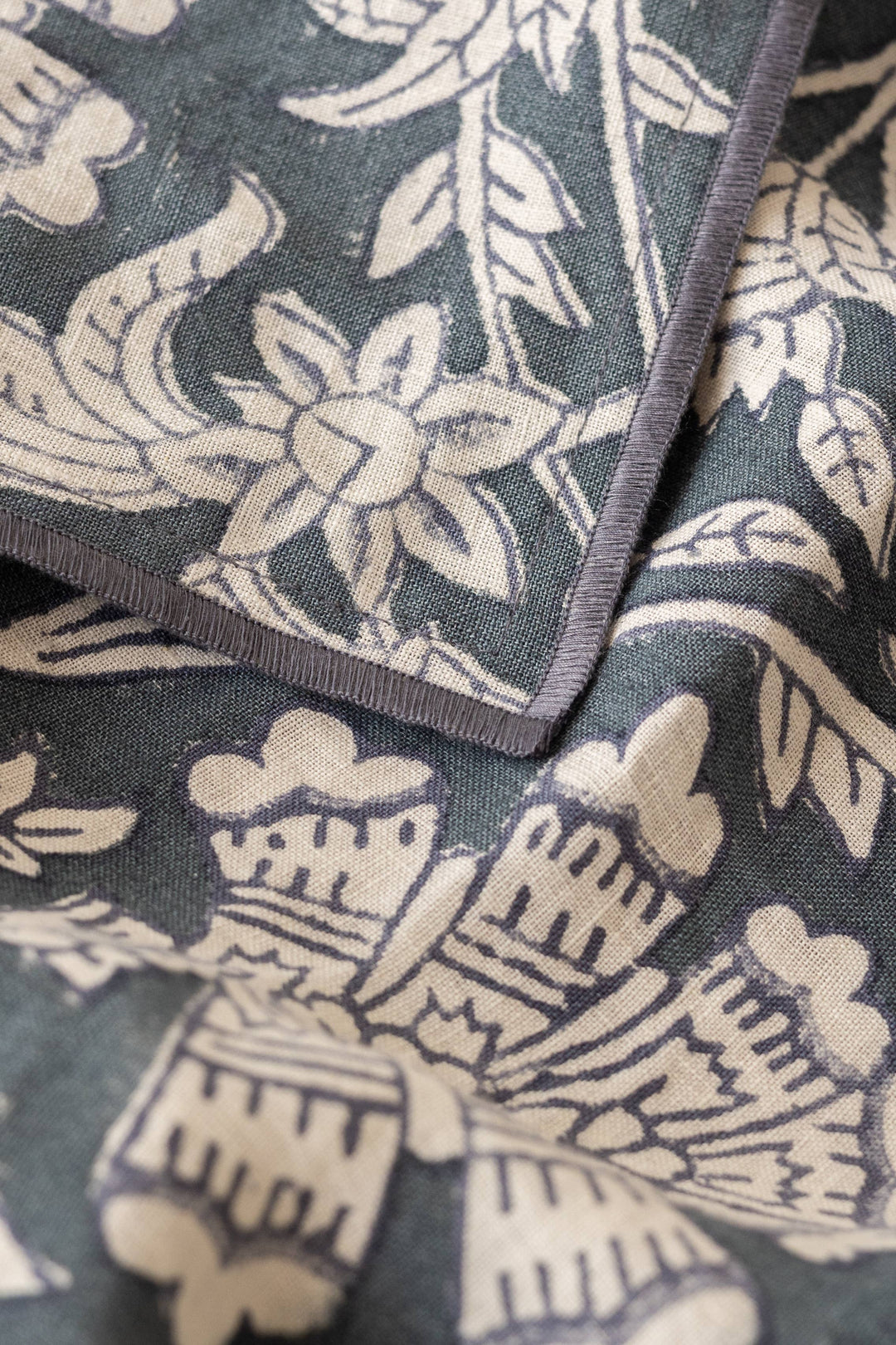 close up photo of navy blue tablecloth