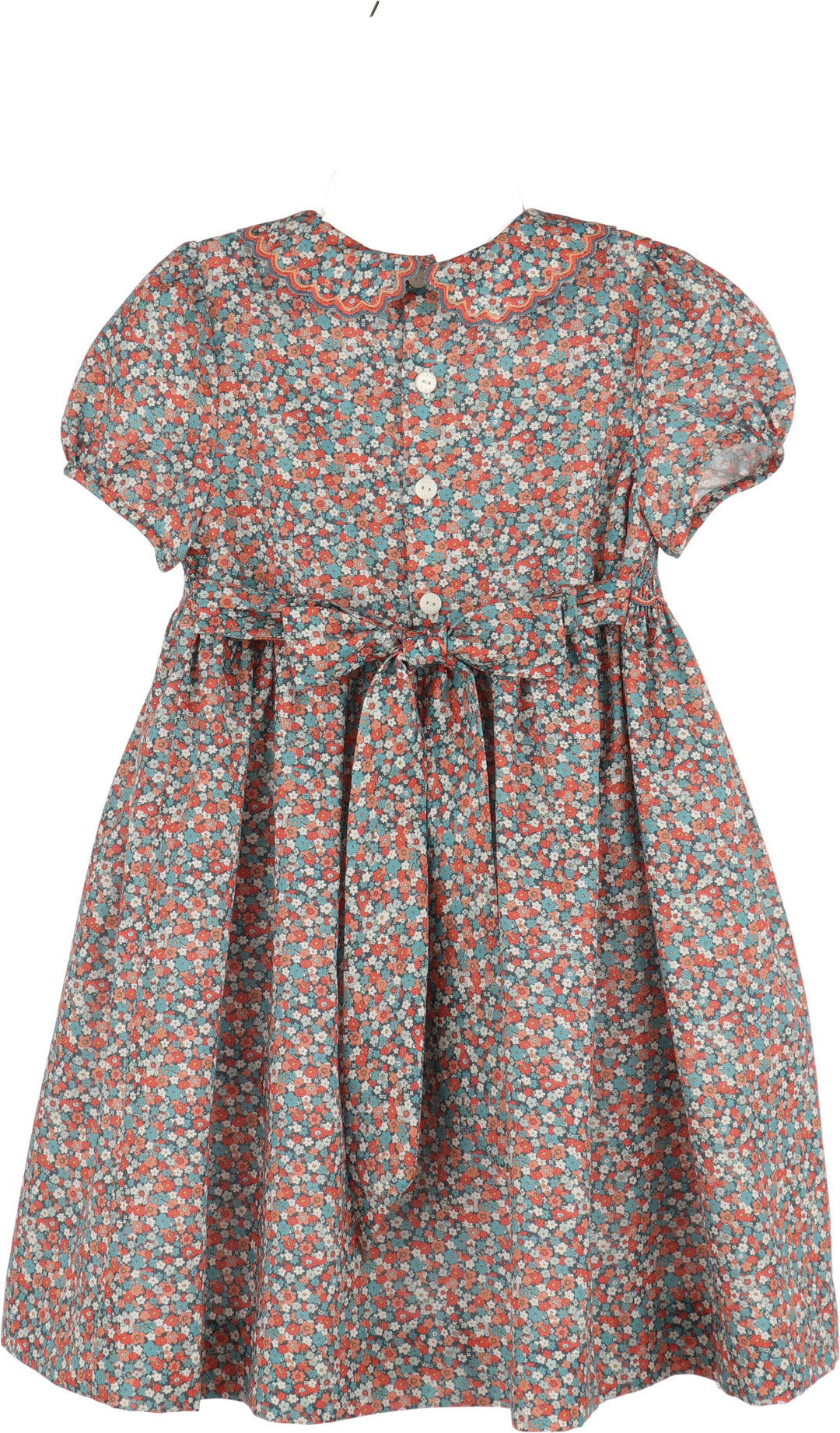 Luli & Me Floral Vintage Dress in blue floral print, back view showing button closure