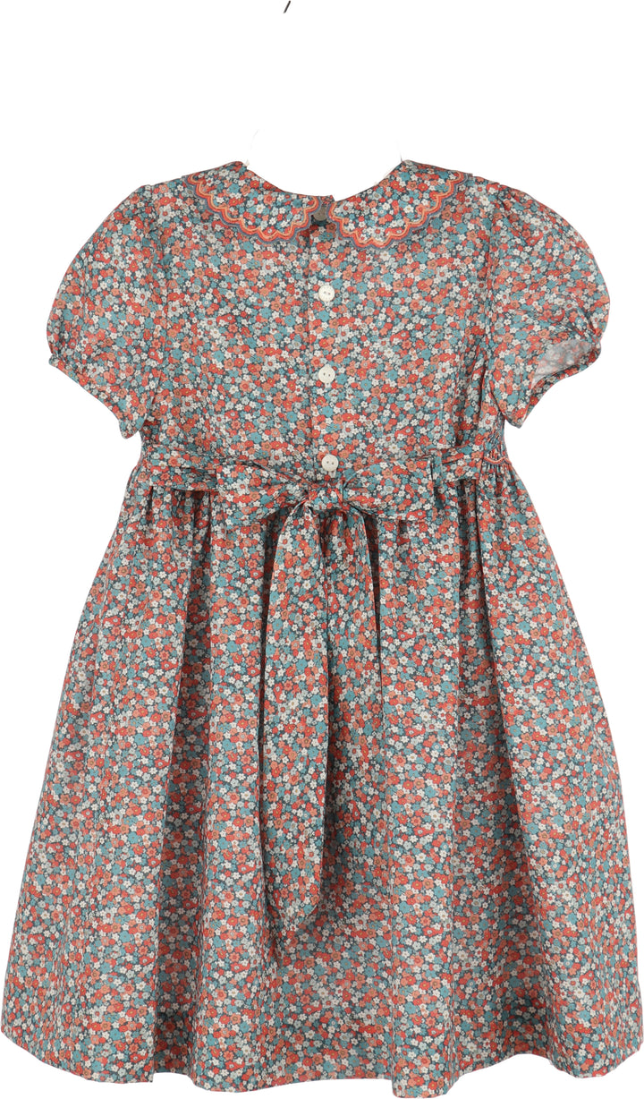 Luli & Me Floral Vintage Dress in blue floral print, back view showing button closure