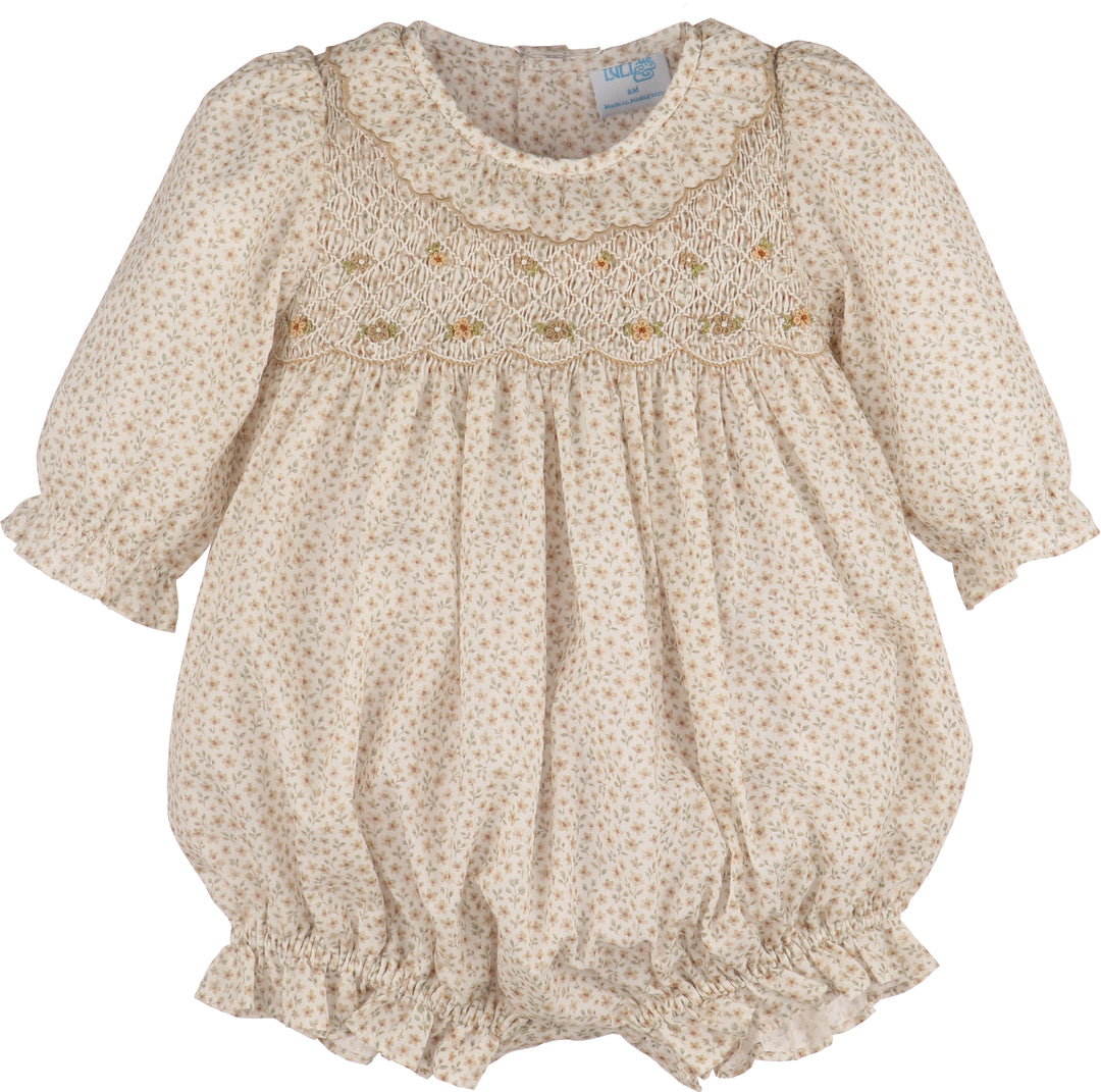 Baby romper with floral pattern on a white background