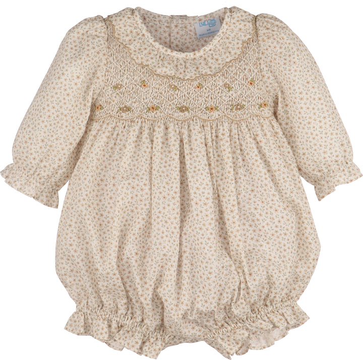 Baby romper with floral pattern on a white background