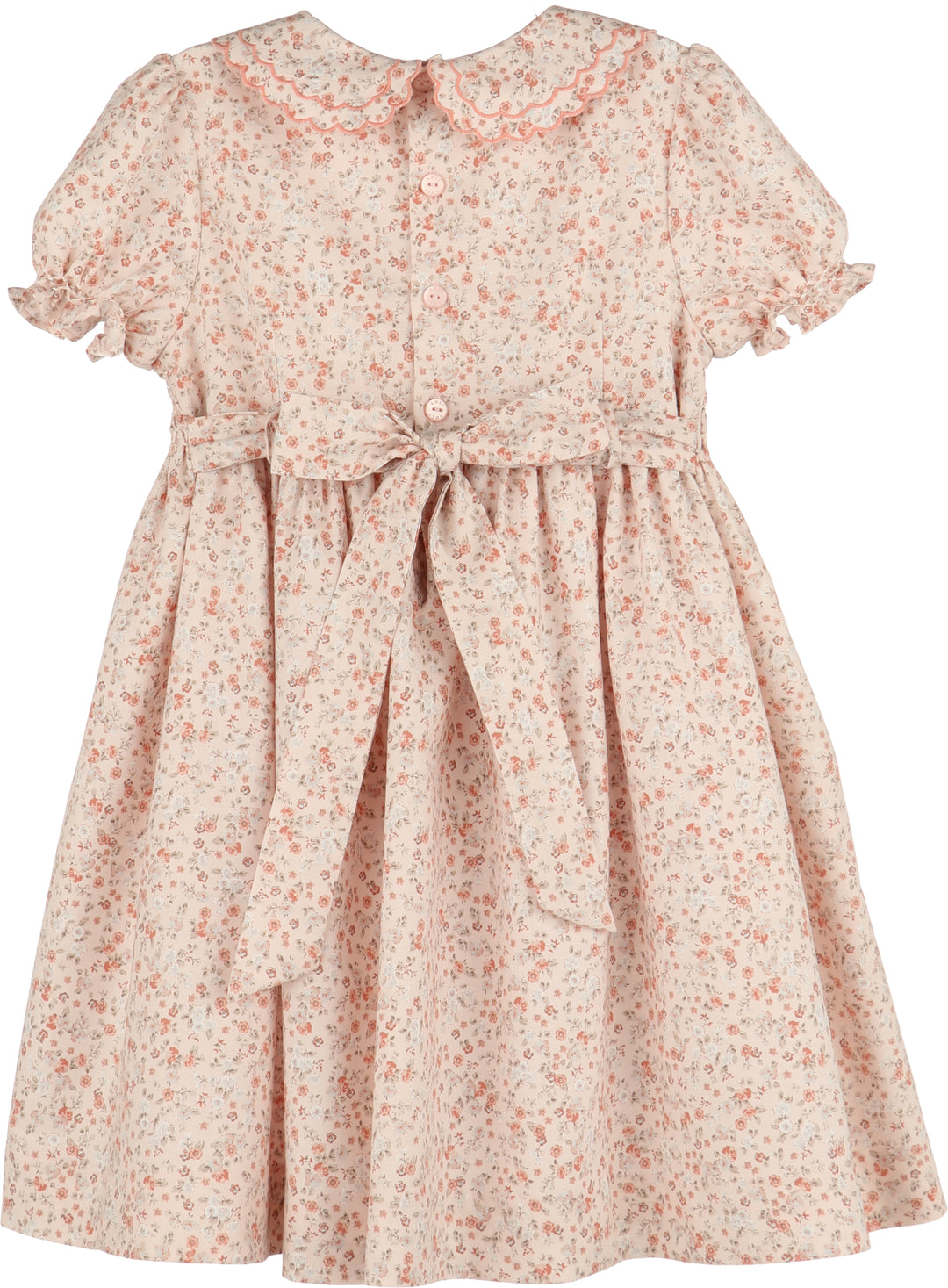 Floral dress with a bow detail on a white background