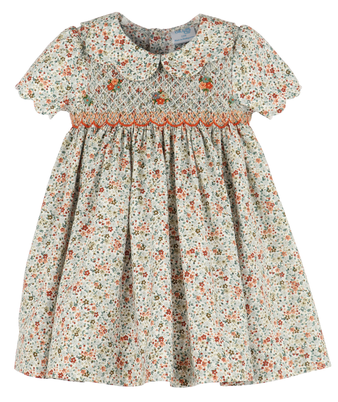 Floral hand smocked dress with fall colors and scalloped sleeve