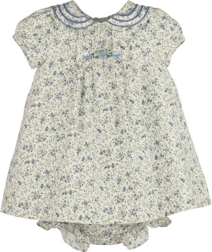 Floral baby romper with blue accents on a white background