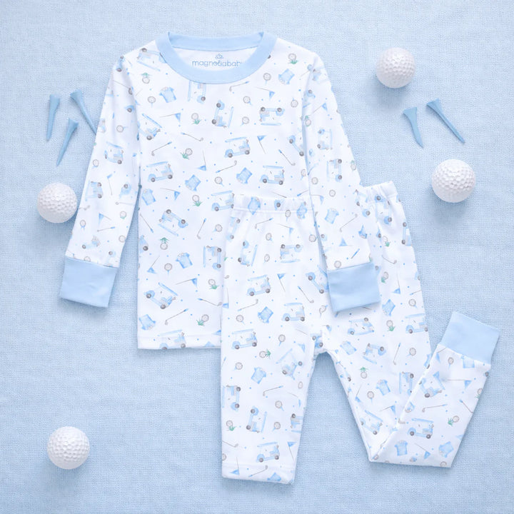 Children's pajama set with golf pattern on a light blue background