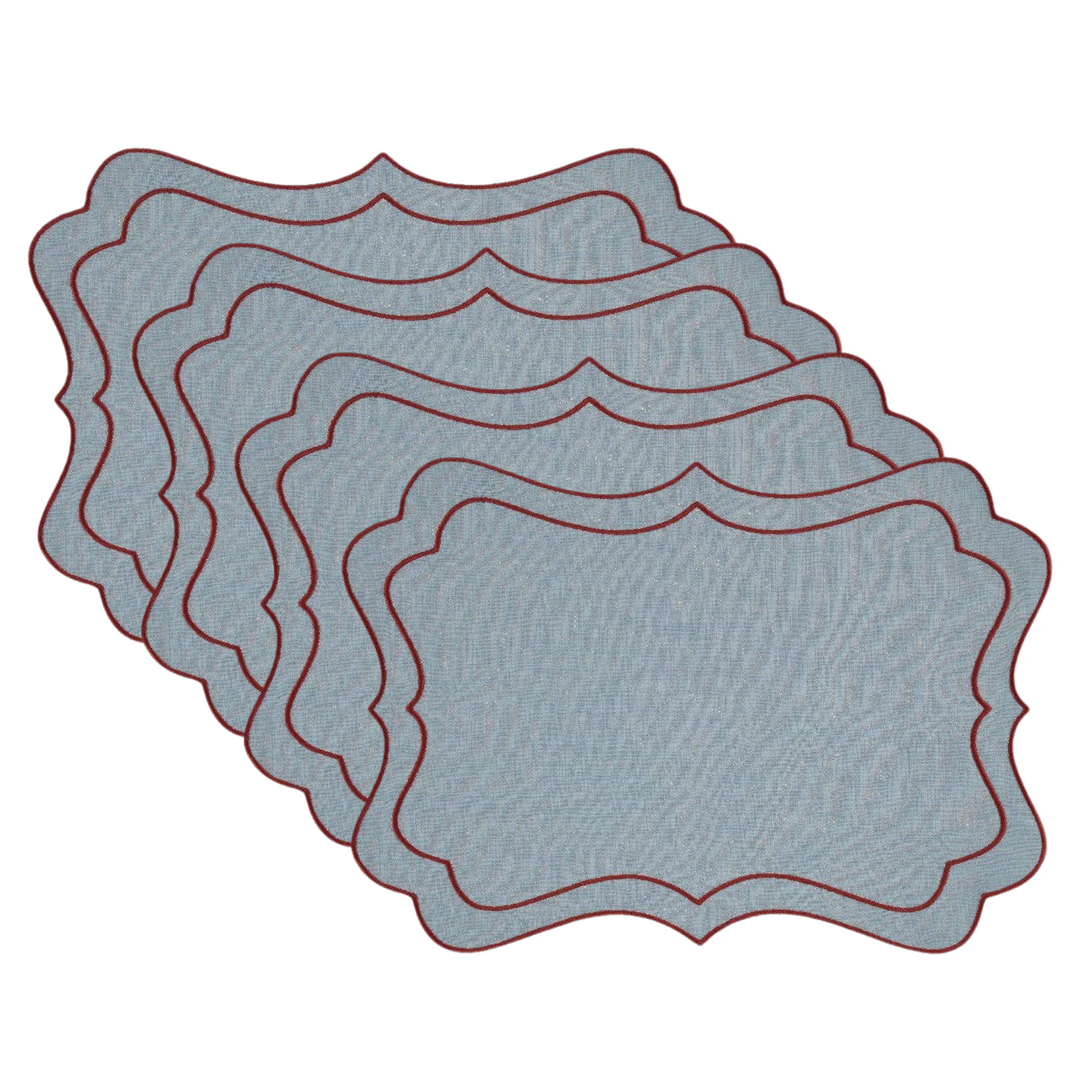 A set of 4 matching rectangular placemats with decorative scalloped edges, fanned out on a plain white background. The placemats have a textured light blue surface with a thin dark red border.