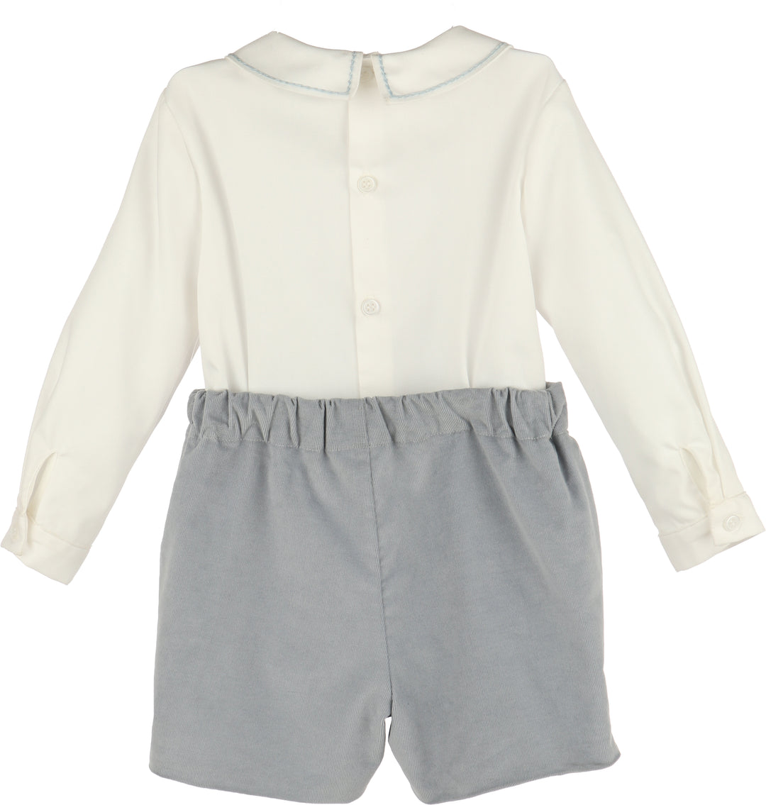 White shirt with long sleeves and blue shorts on a white background