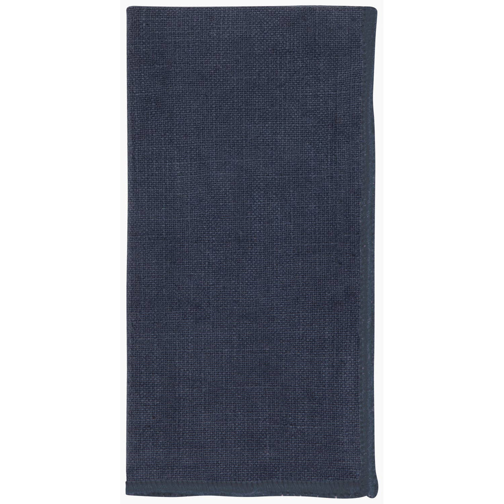 A dark navy blue rectangular towel or cloth with a textured woven surface, shown flat against a plain white background.