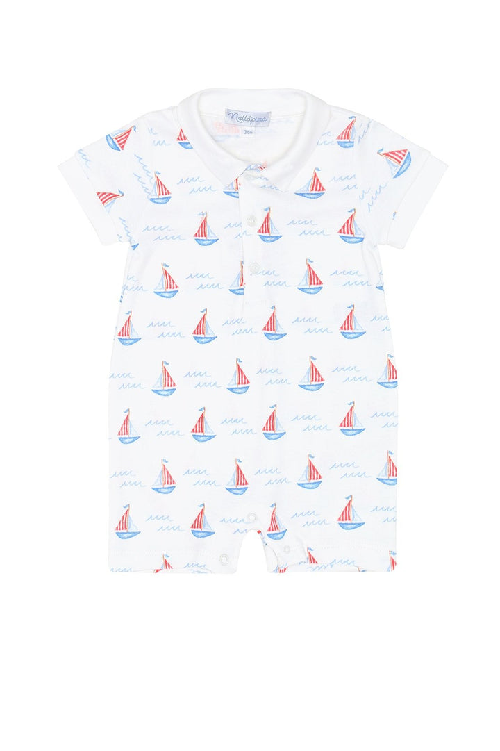 White romper with sailboat pattern on a white background