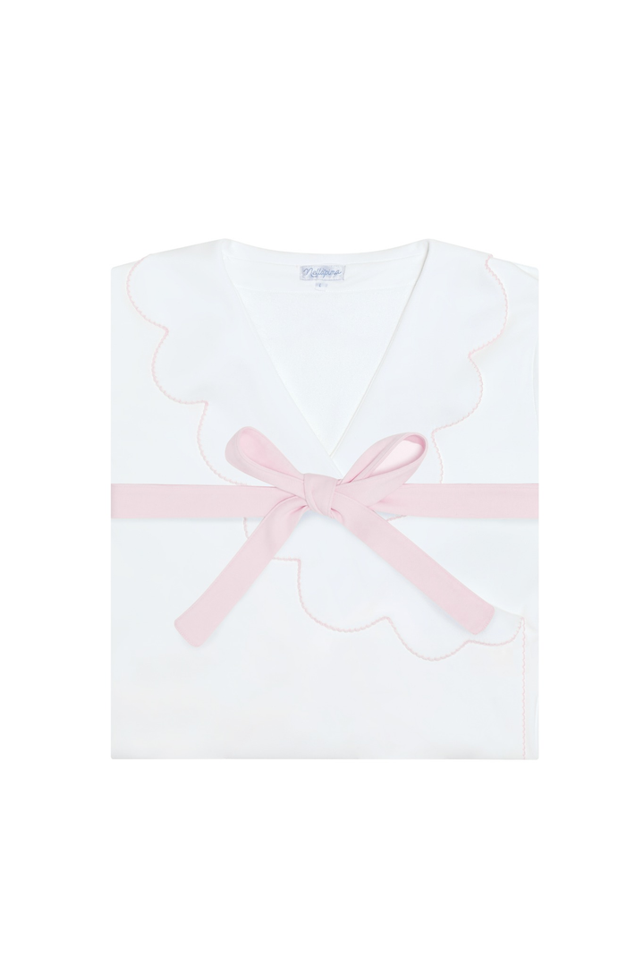 A white baby robe with a scalloped neckline, a light pink ribbon tied in a bow at the center, and a thin pink embroidered border, shown flat on a white background.