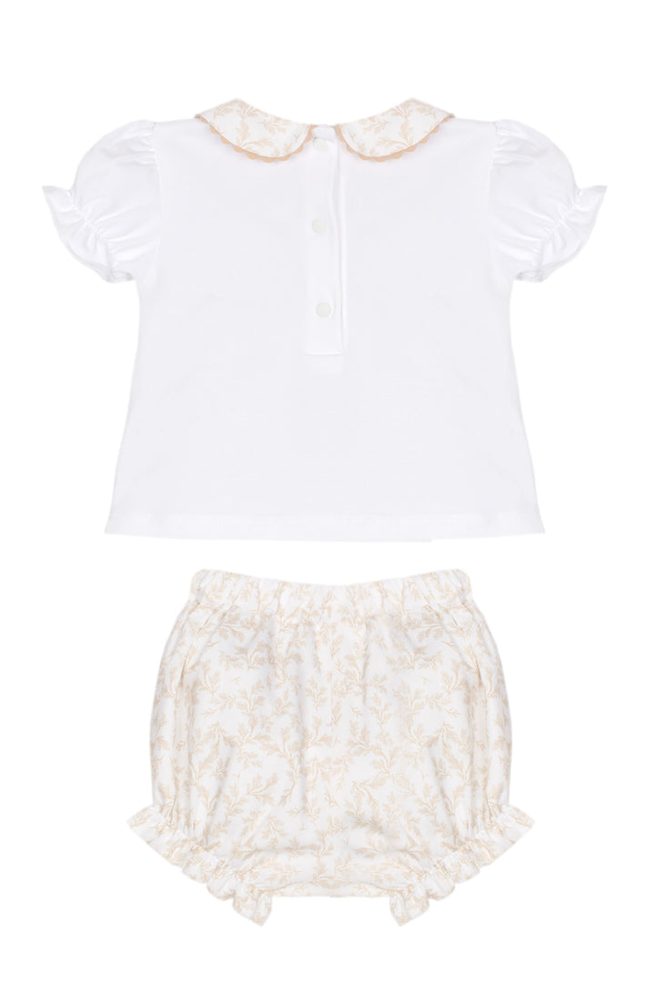 White blouse with lace collar and matching bloomers on a white background