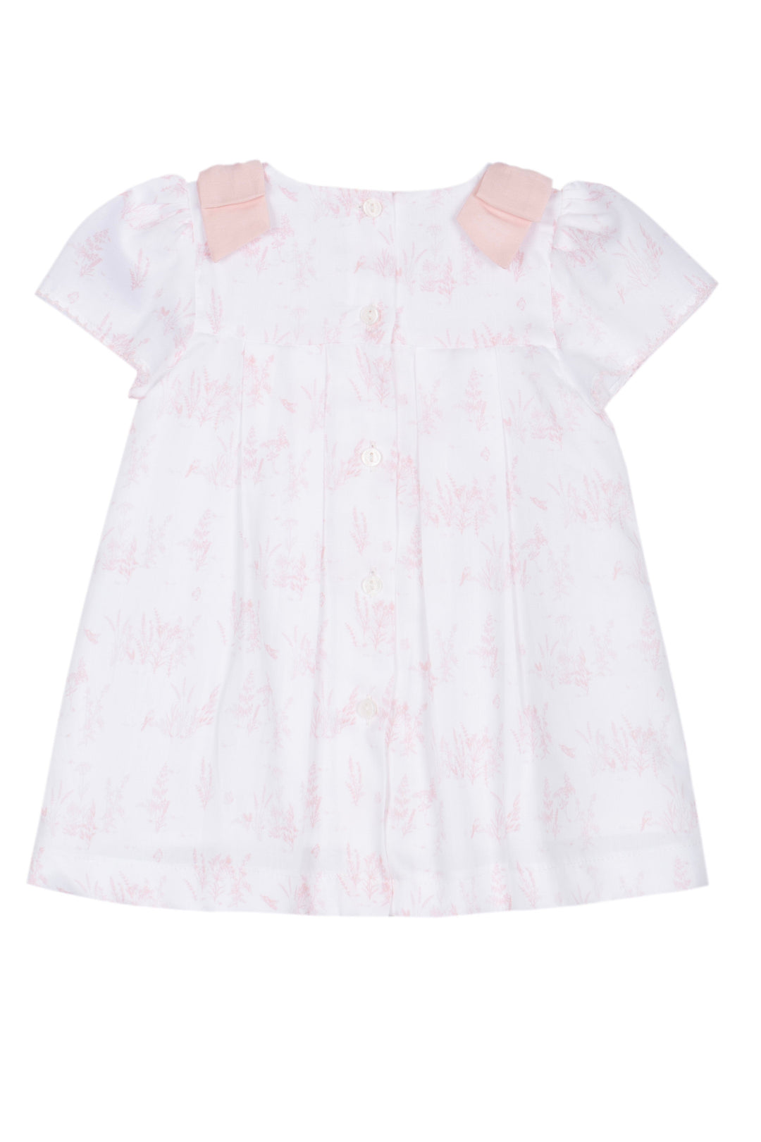 White baby girl dress with pink floral pattern on a white background