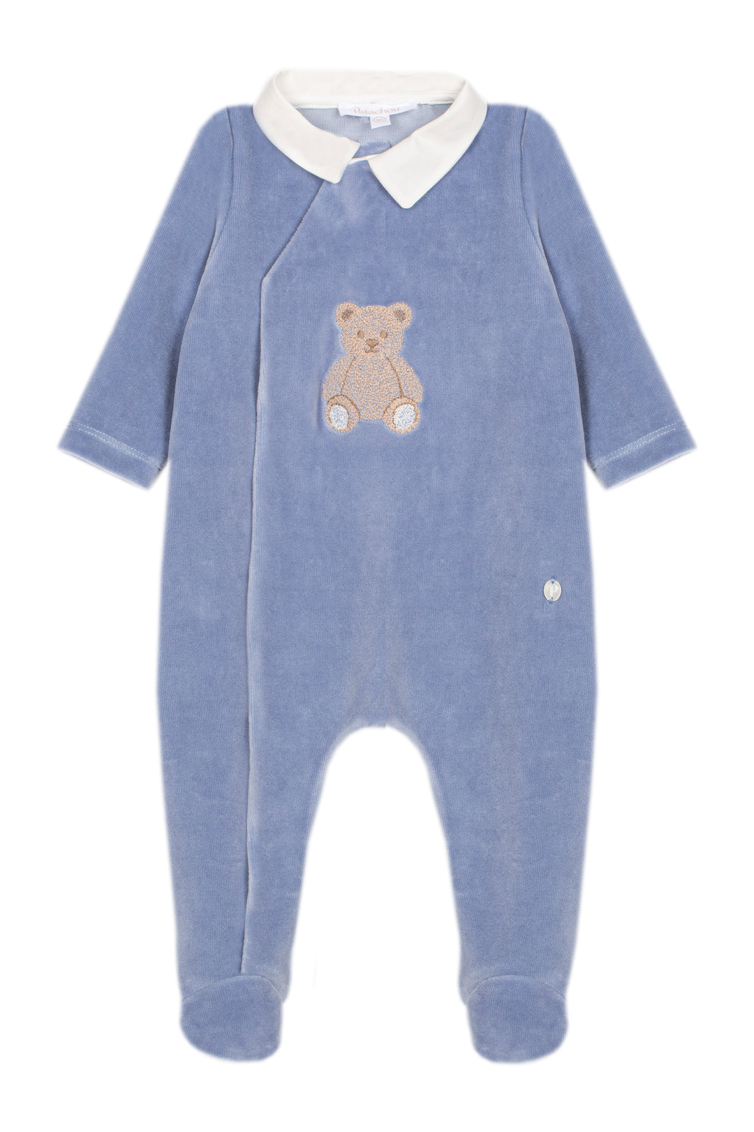 A baby footed sleeper in dusty blue velour with a white collar and an embroidered teddy bear on the chest, shown against a plain white background.