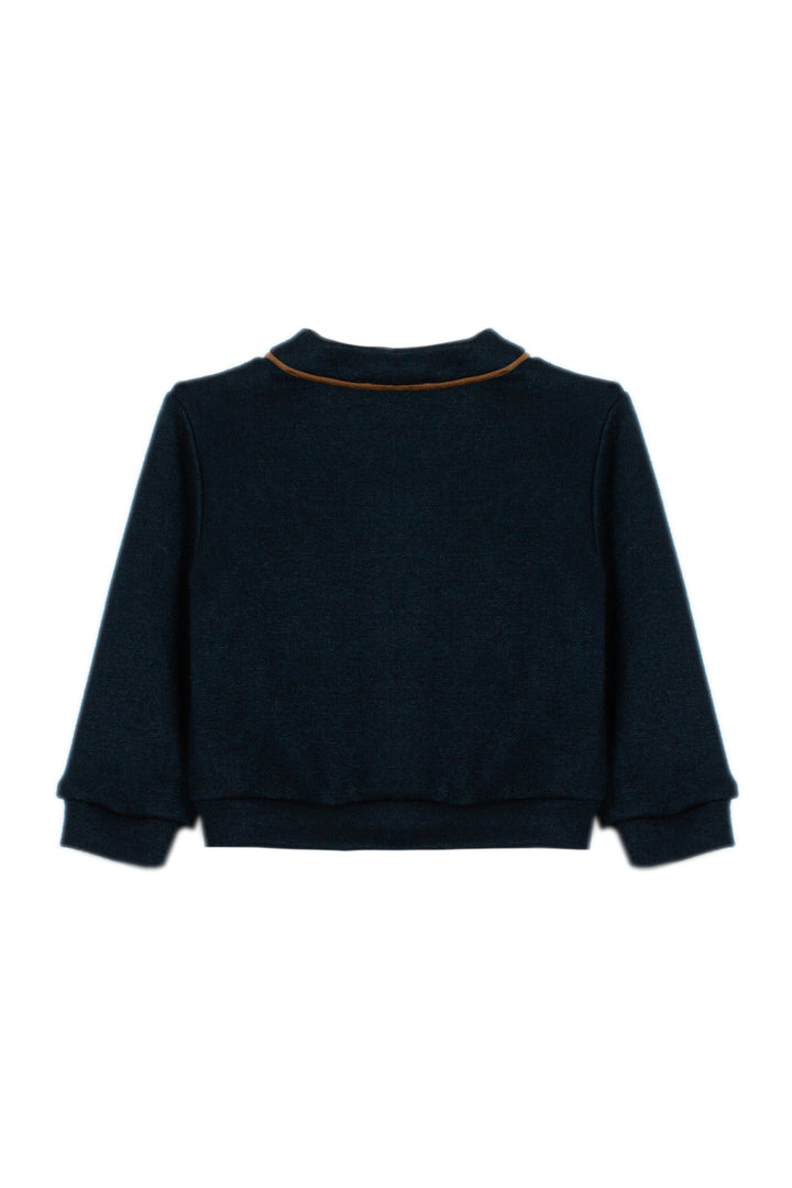 A dark navy blue knit sweater with a thin tan contrast trim along the collar, shown from the back on a plain white background.