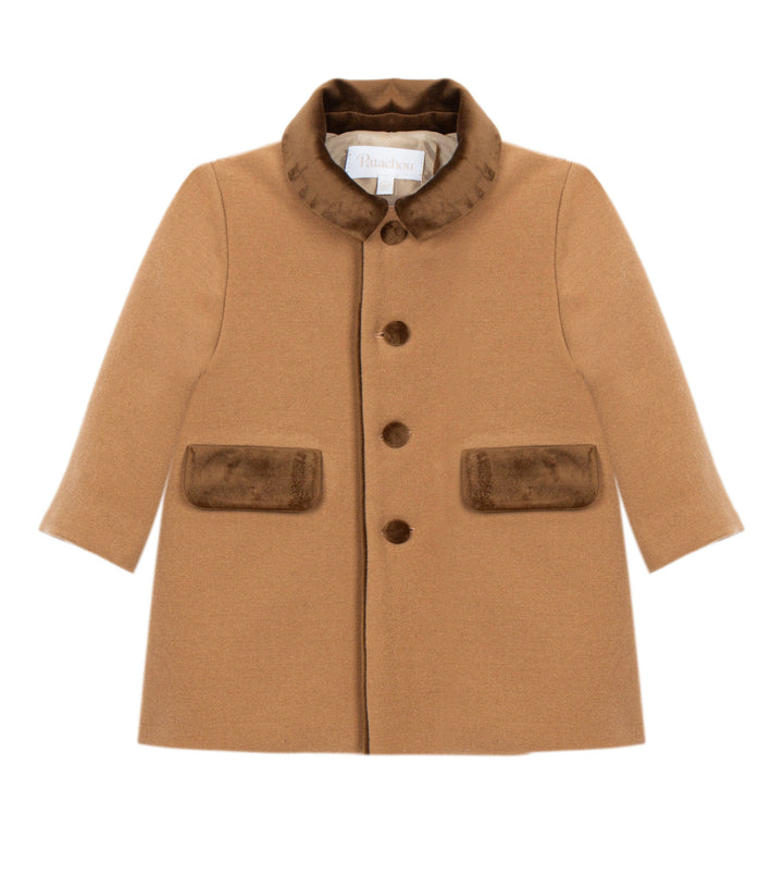 A toddler's camel-colored coat with brown faux-fur trim on the collar and front patch pockets, featuring a three-button front closure.