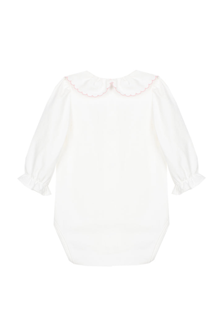 A white long-sleeve baby dress with a ruffled Peter Pan collar and ruffled cuffs, shown flat against a white background.