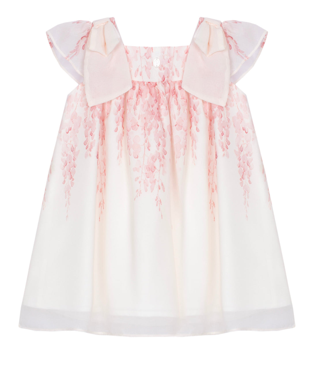 White dress with pink floral pattern on a white background