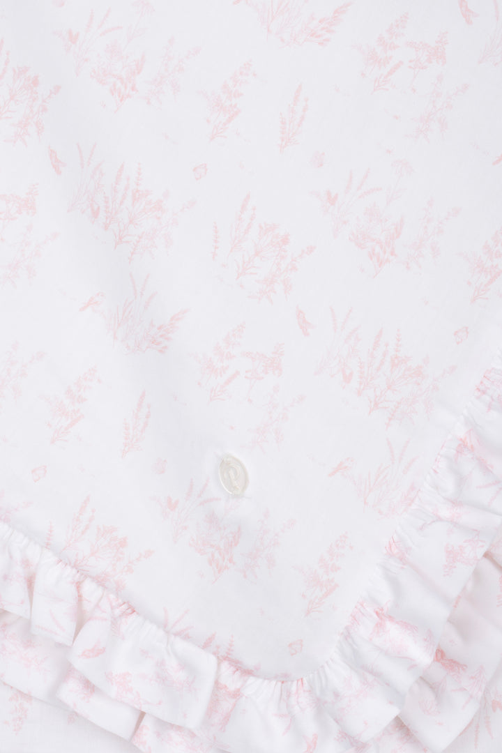 Close-up of a textured white fabric with subtle patterns