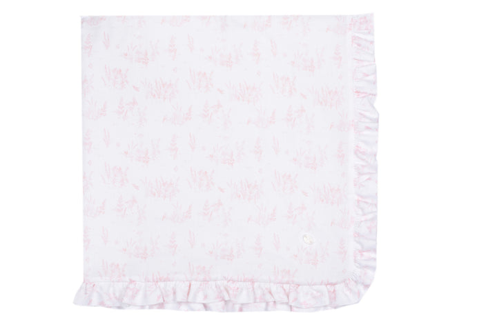 White baby blanket with ruffled edge on a white background