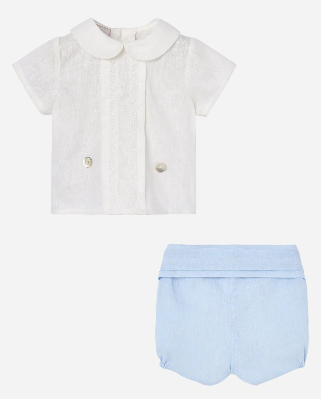 White shirt with a collar and light blue shorts on a gray background