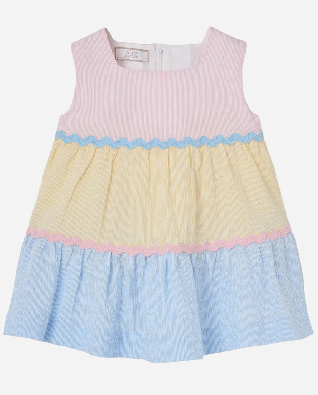 Pastel color-blocked dress with pink, yellow, and blue on a light gray background