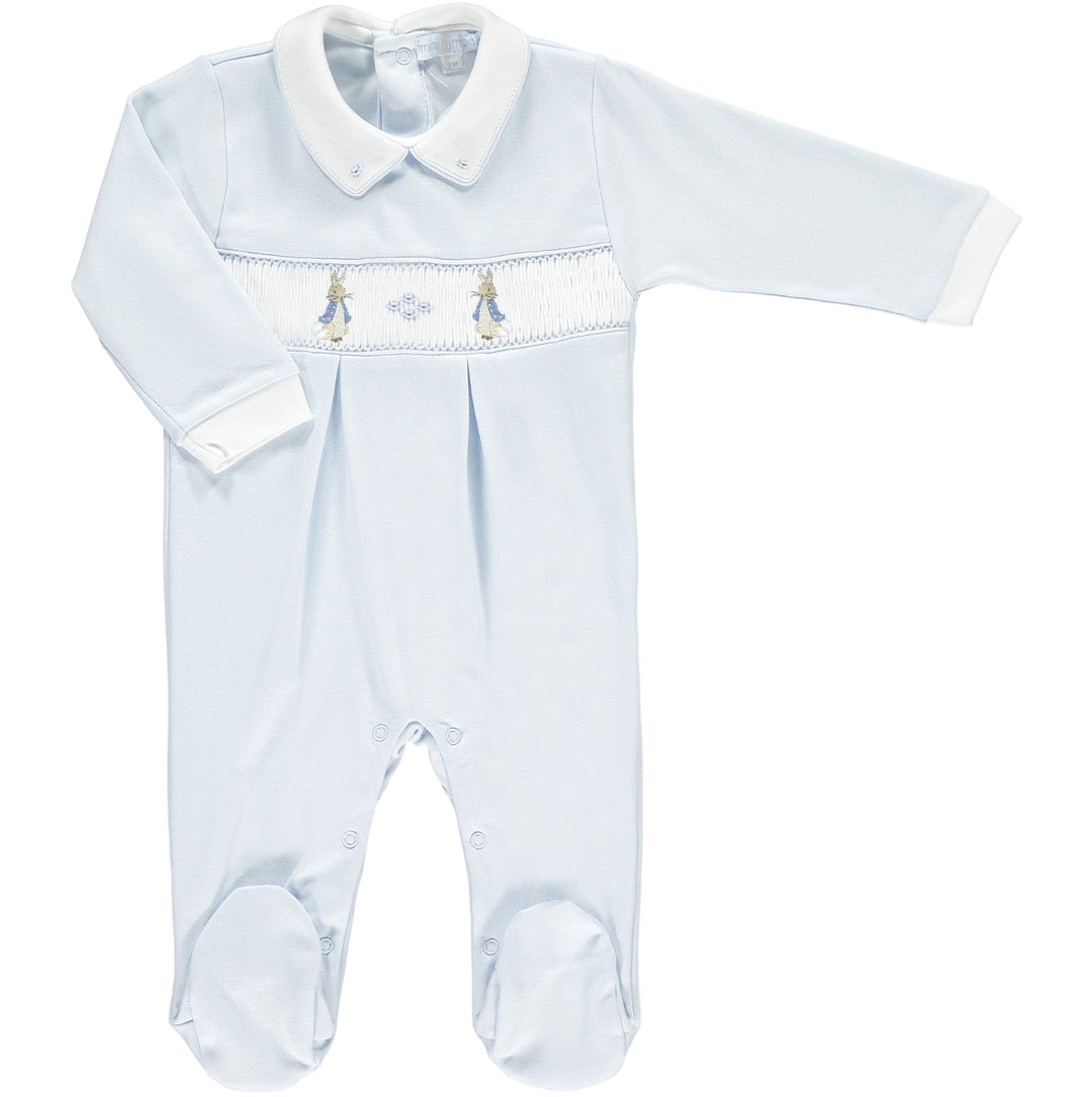 Baby Blue Footie with Hand Embroidered Peter Rabbit Motif and smocking detail on a white background