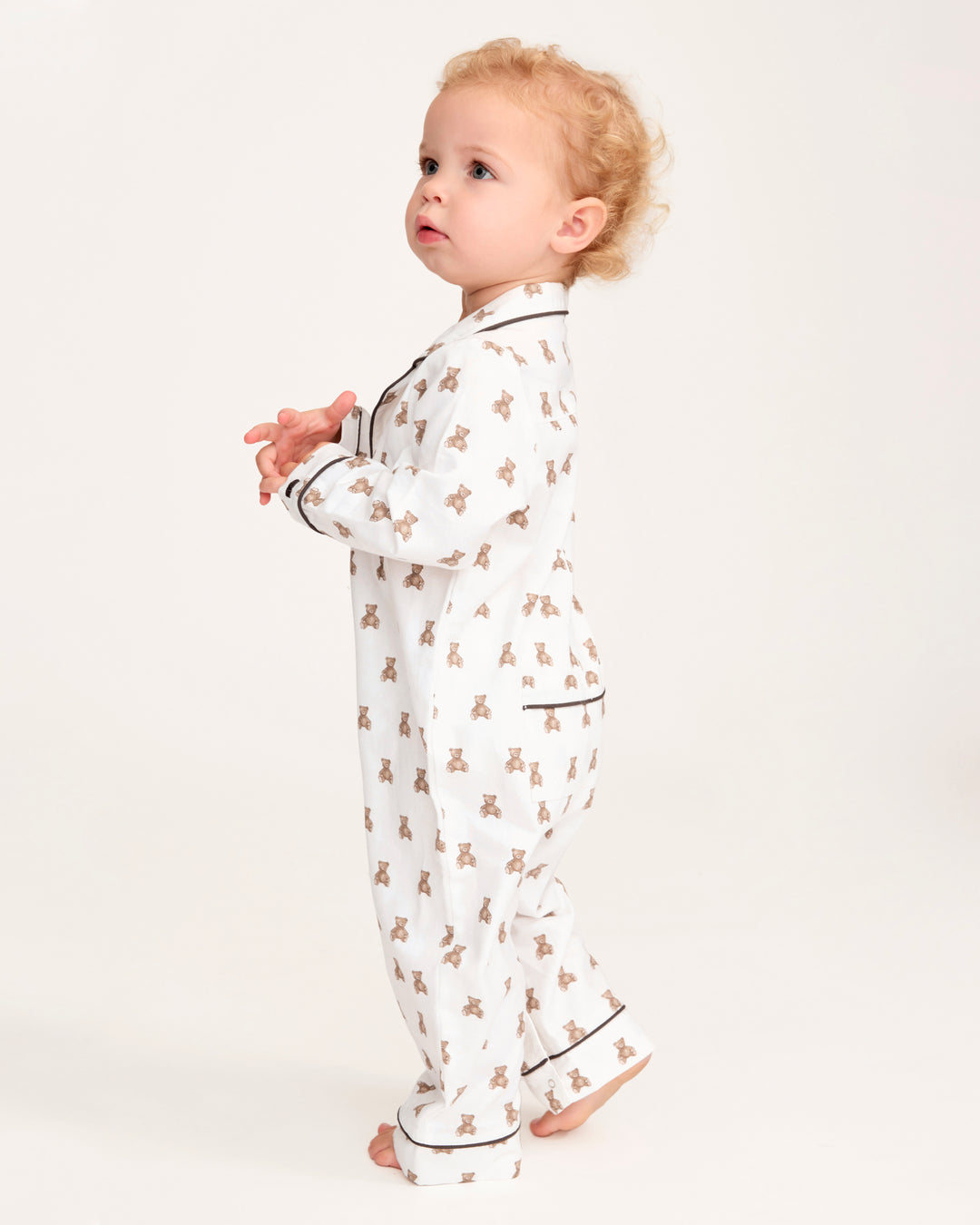 Toddler in teddy bear romper