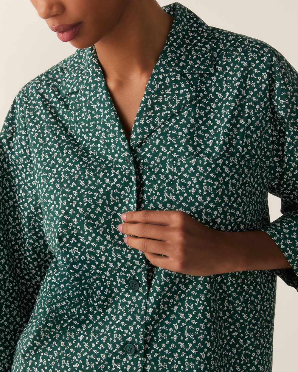close up photo of women's sleepwear top