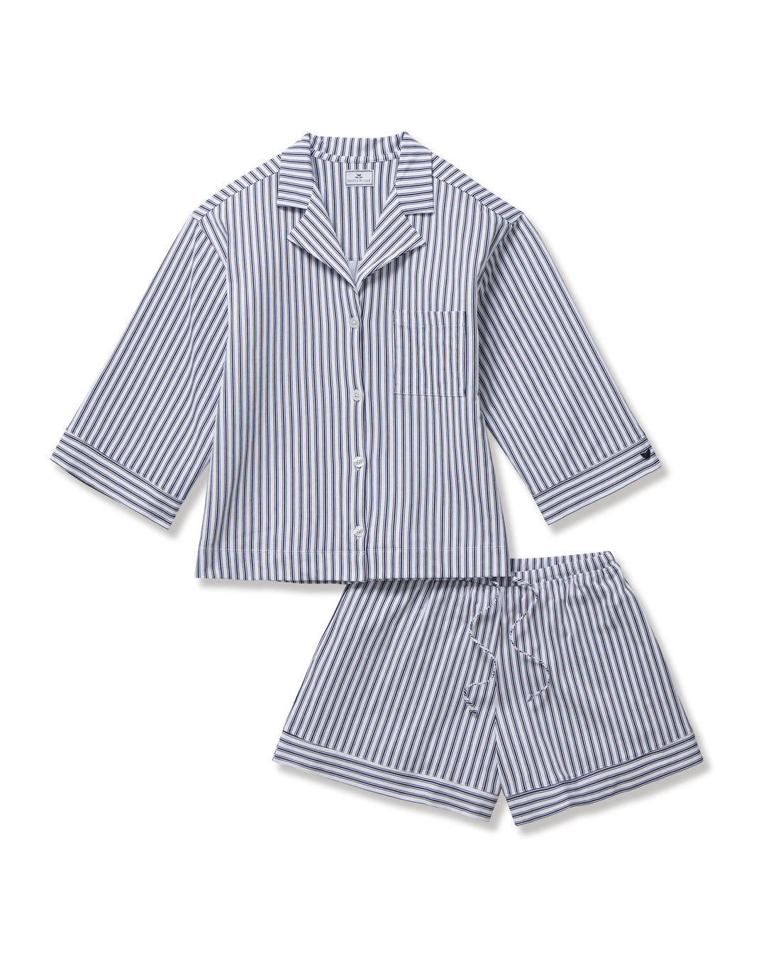 Striped pajama set with shirt and shorts on a white background