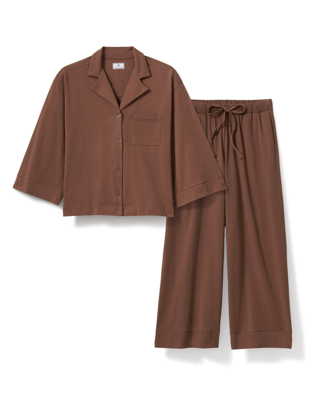 Brown pajama set with shirt and pants on a white background