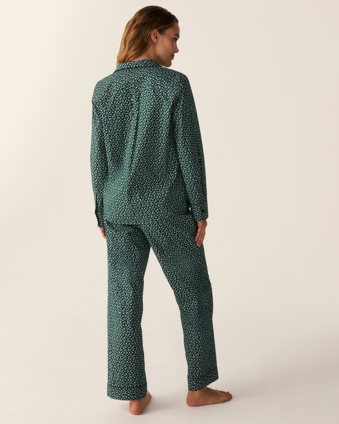 Women wearing green floral print pajama set