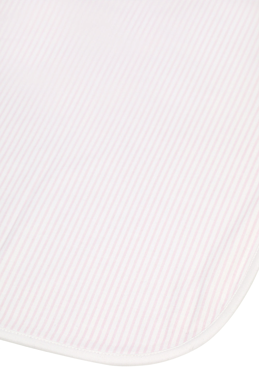 A close-up of a white ribbed fabric with a rounded corner and a thin white stitched edge, shown against a white background.