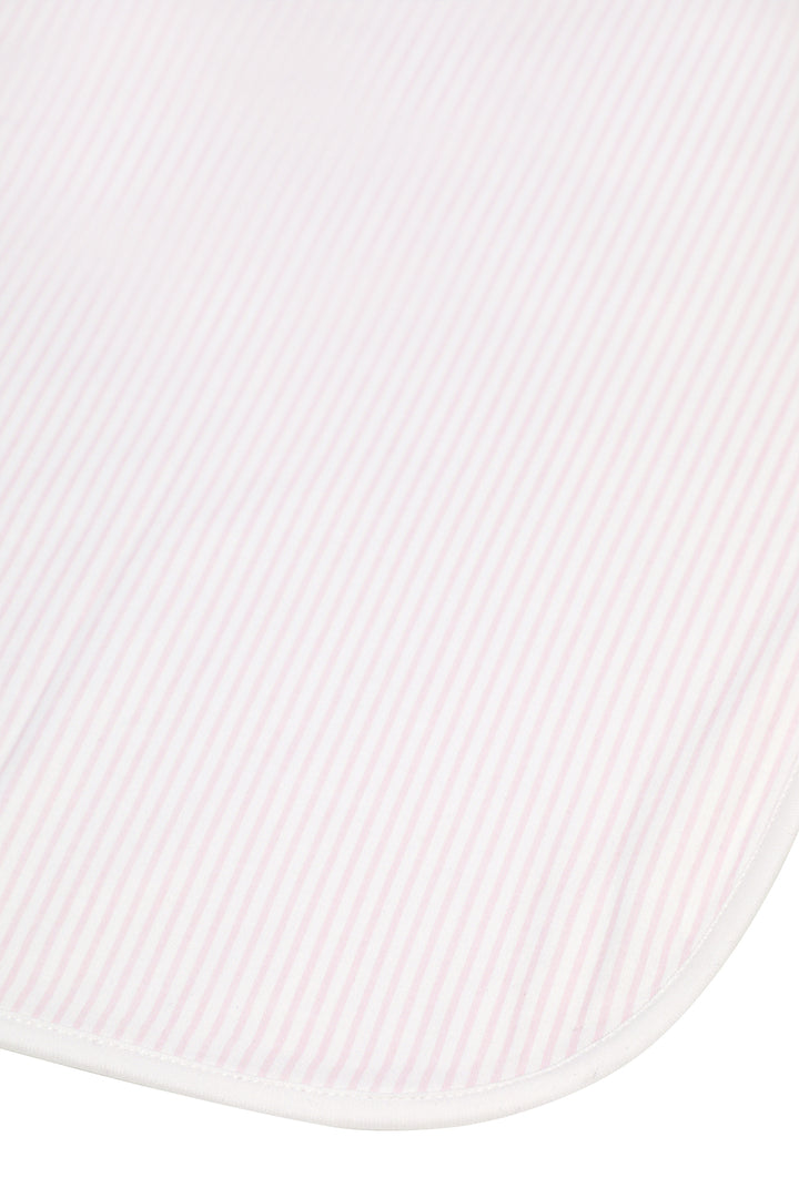 A close-up of a white ribbed fabric with a rounded corner and a thin white stitched edge, shown against a white background.