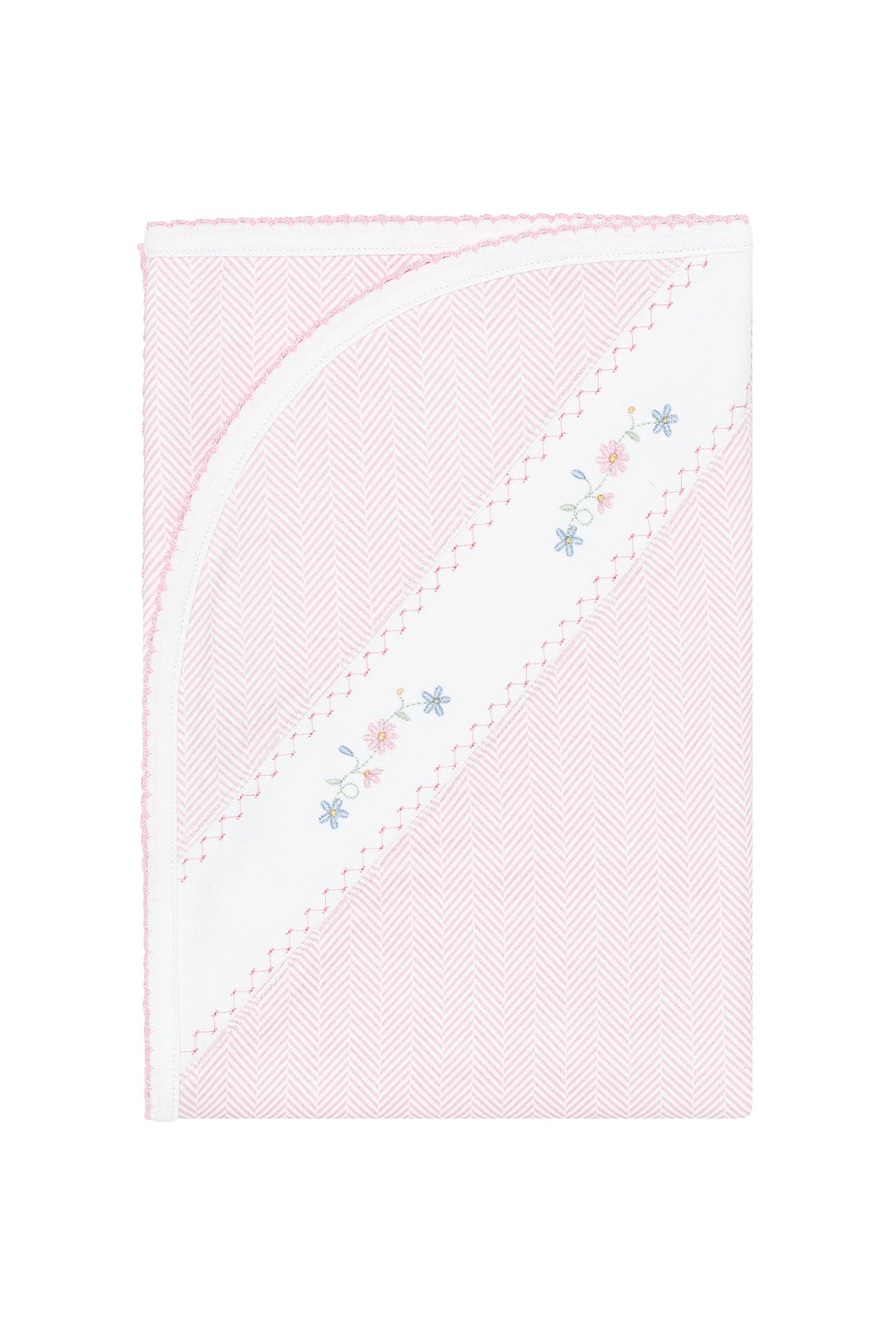 A folded baby blanket in light pink and white with a herringbone pattern, featuring a diagonal white stripe with delicate embroidered floral details in pink, blue, and yellow.