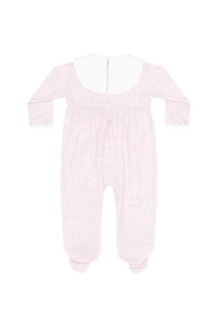 A light pink baby footed sleeper with long sleeves, a wide white collar, and a back zipper, shown flat on a white background.