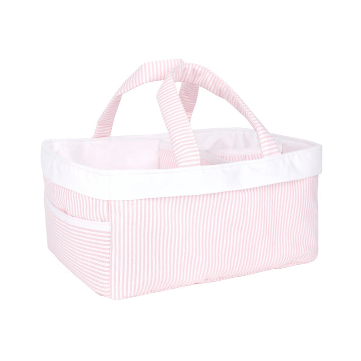 Pink woven basket with white trim on a white background
