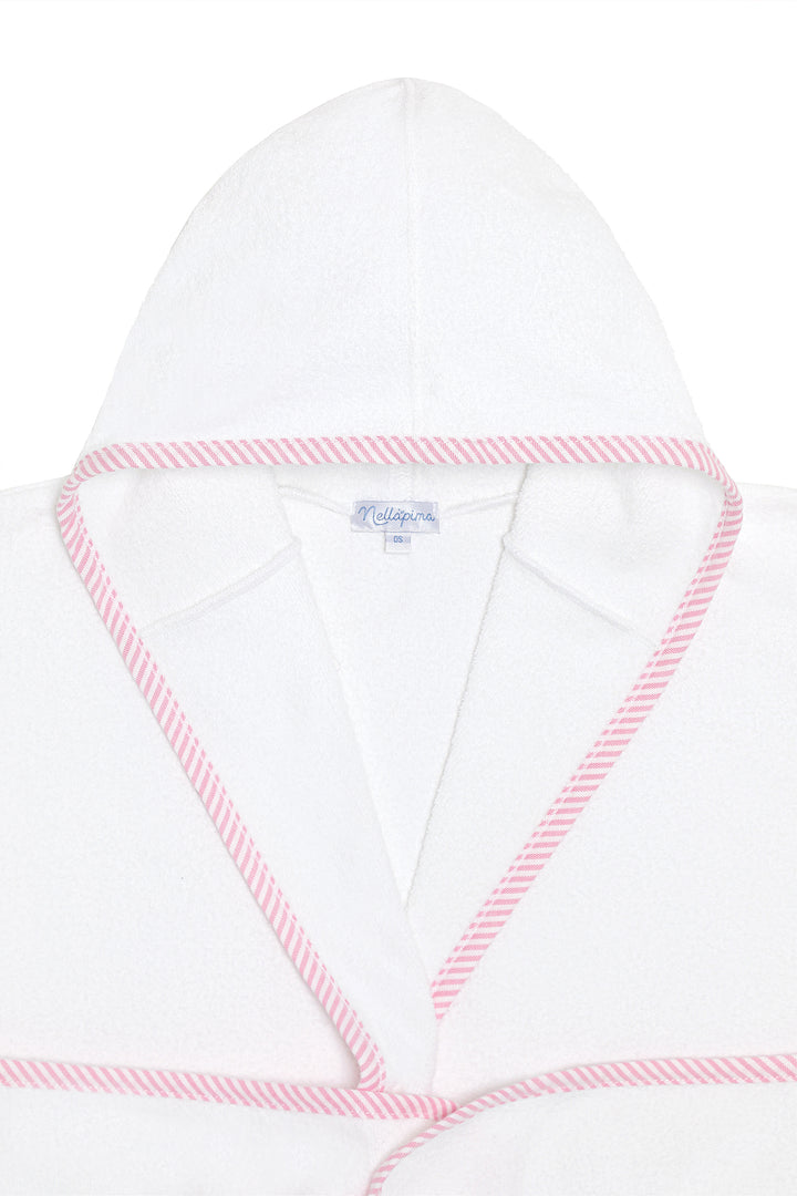 A close-up of a white hooded robe or bathrobe with pink and white striped trim along the hood edge and neckline.