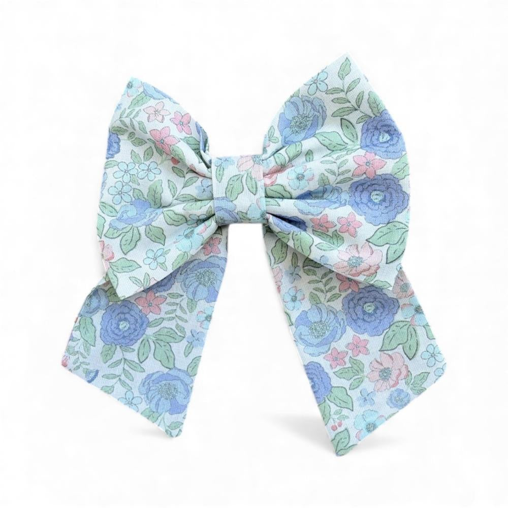 Floral patterned bow on a white background