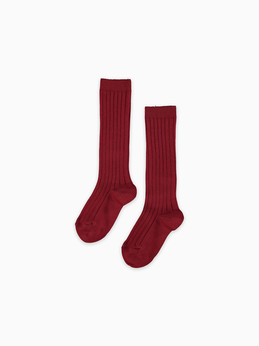Pair of red socks on a white background