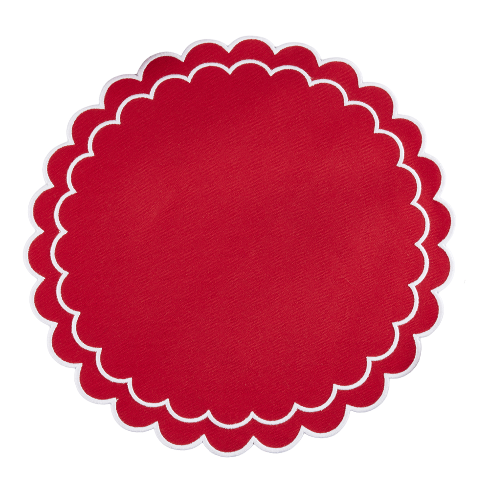 Red scalloped placemat on a white background