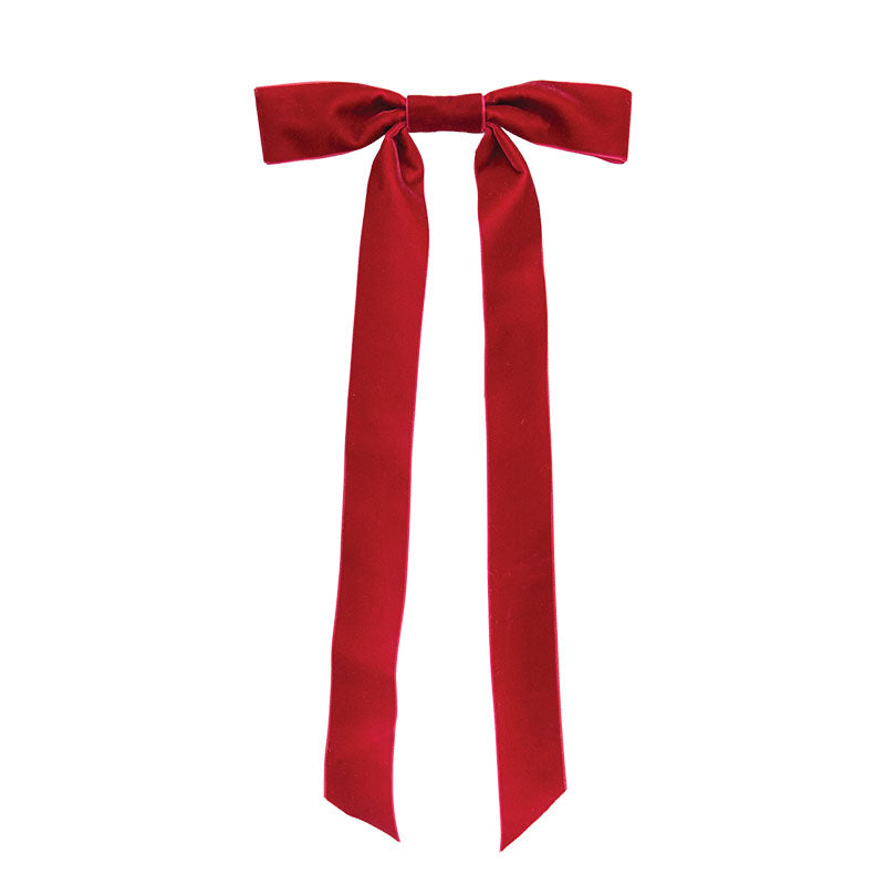 A bright red satin bow with two long tails, tied in the center and photographed against a plain white background.