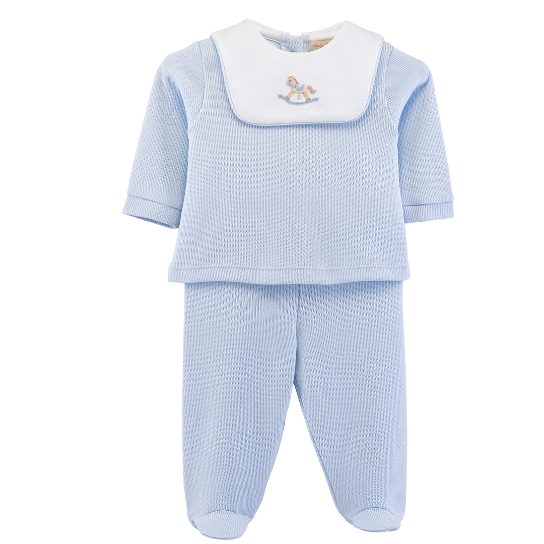 A baby footed one-piece outfit in light blue with a contrasting white bib collar featuring a small embroidered rocking horse.